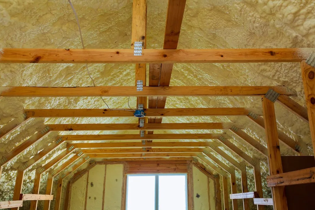 Finished spray foam insulation surface